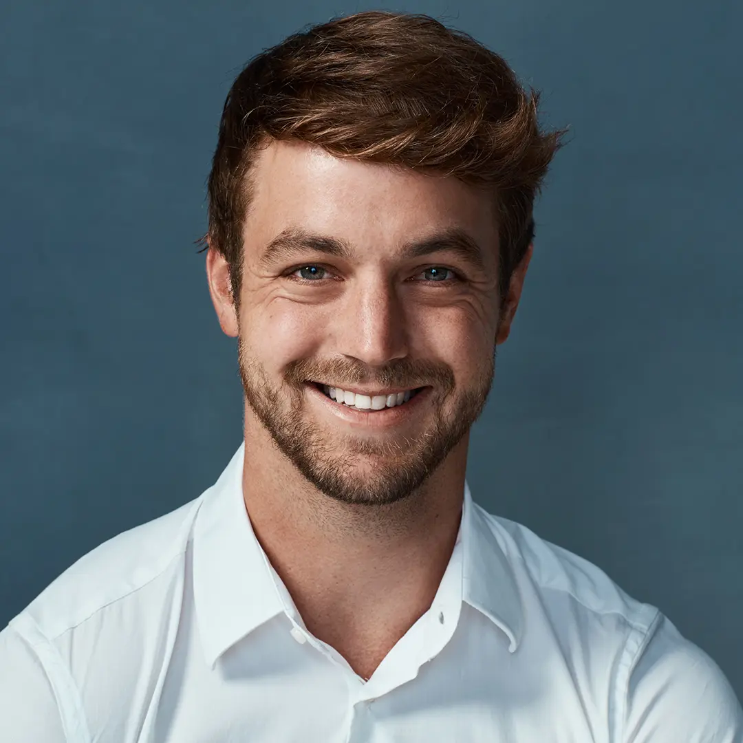 man posing smiling